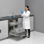 Undercounter FlaskScrubber Glassware Washer, with Scientist Holding Glassware